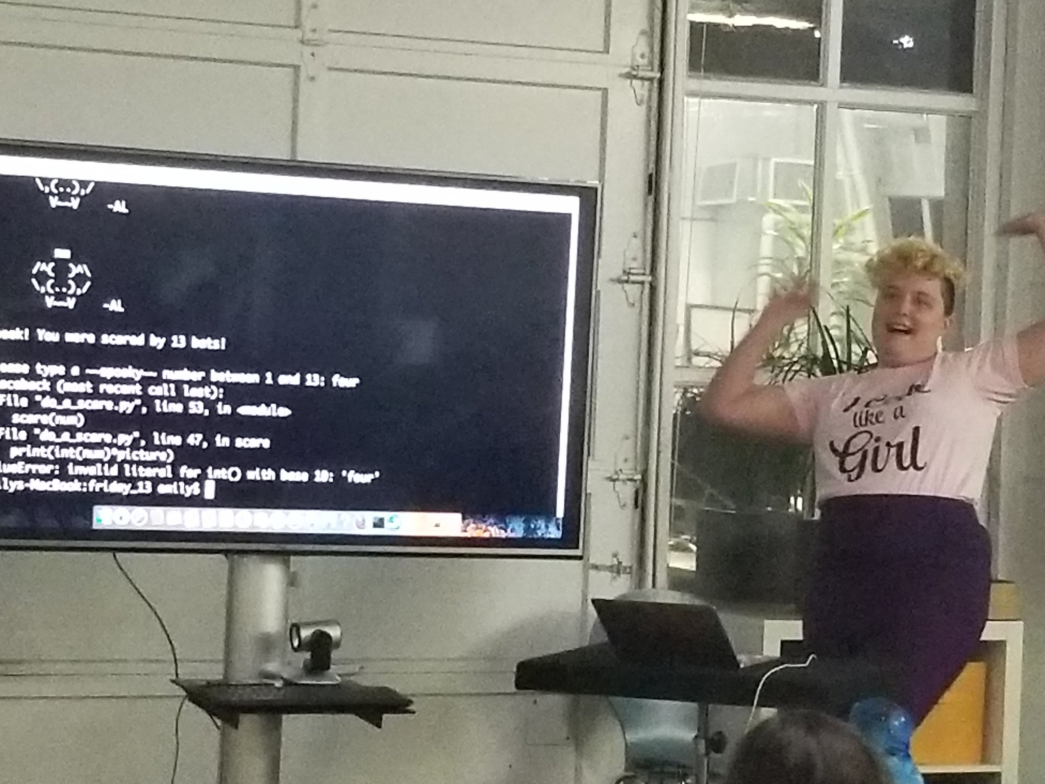 A picture of me presenting my spooky presentation, and screaming about a scary error message